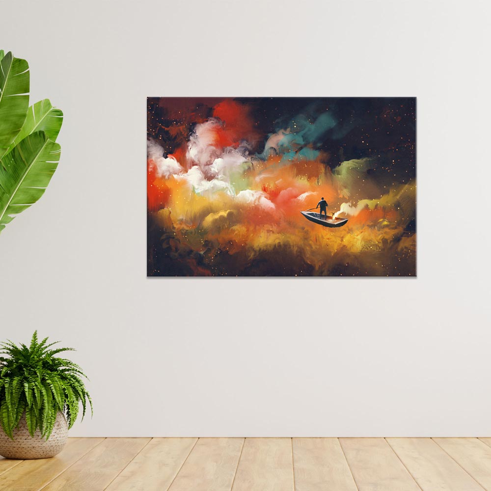 Leinwandbild "Mann im All" an weißer Wand