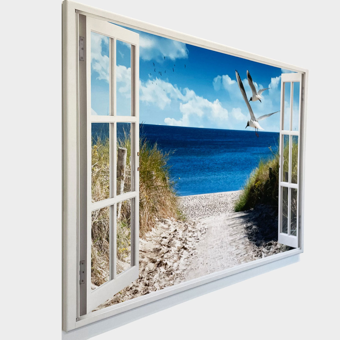 Leinwandbild mit farbbrillanten Druck per Hand auf Holzrahmen gespannt mit Festerblick auf Strand und Möwen
