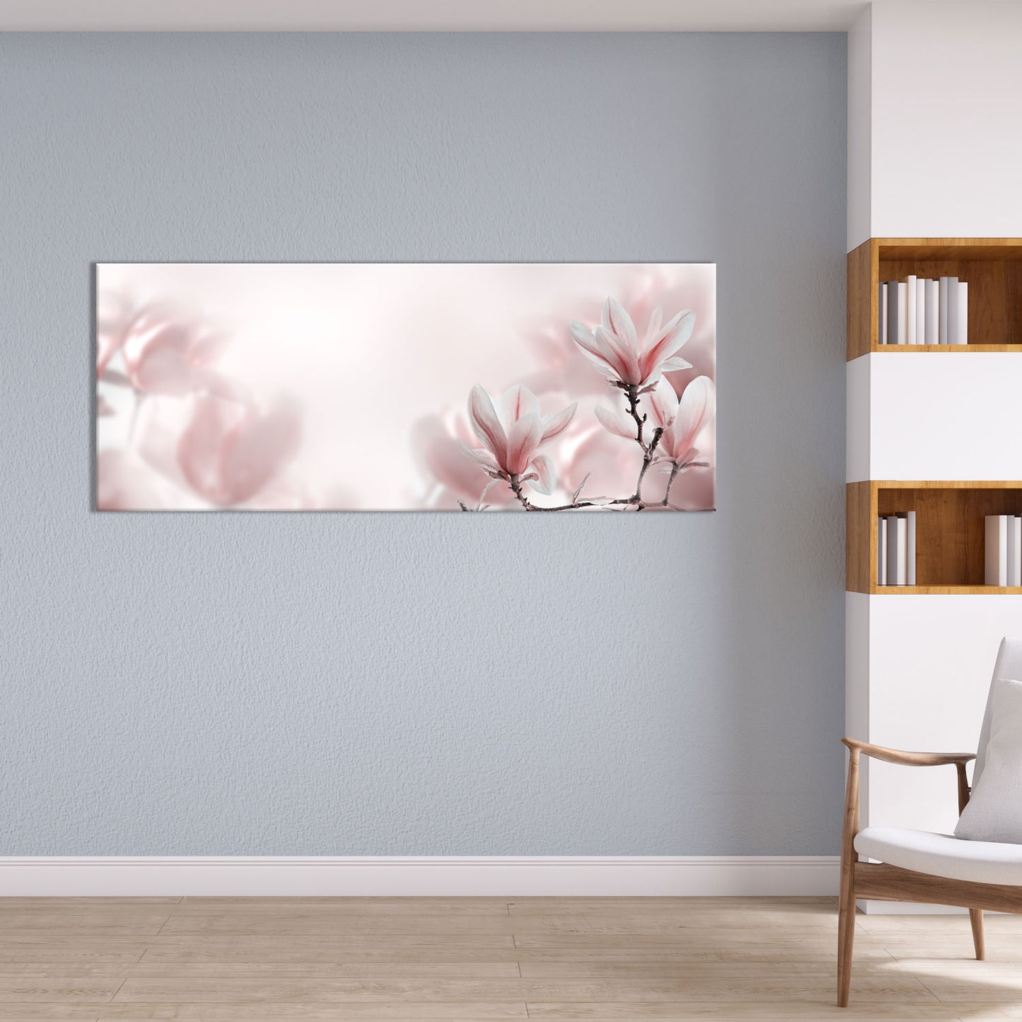 Leseecke zum entspannen mit Blick auf traumhafte, pastellfarbende Magnolienblüten gedruckt auf Leinwand