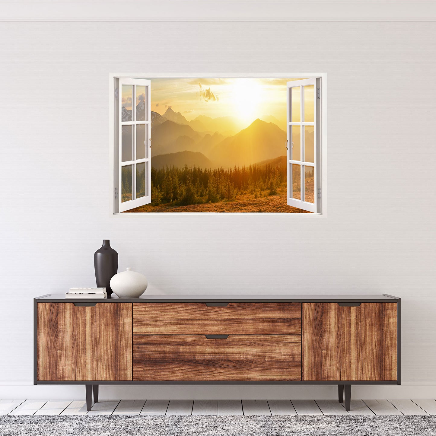 Dekoratives Wandbild mit offenem Fensterblick auf eine atemberaubende Berglandschaft bei Sonnenuntergang. Perfekte Wanddekoration für das Wohnzimmer – hochwertiger Druck von Wallspirit.