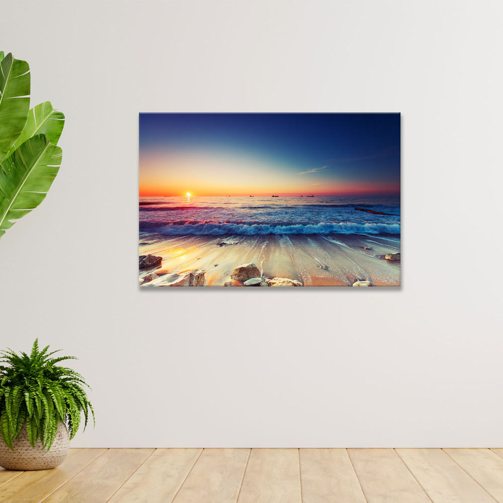 Canvasbild "Sonnenaufgang am Meer" in begrünter Ecke