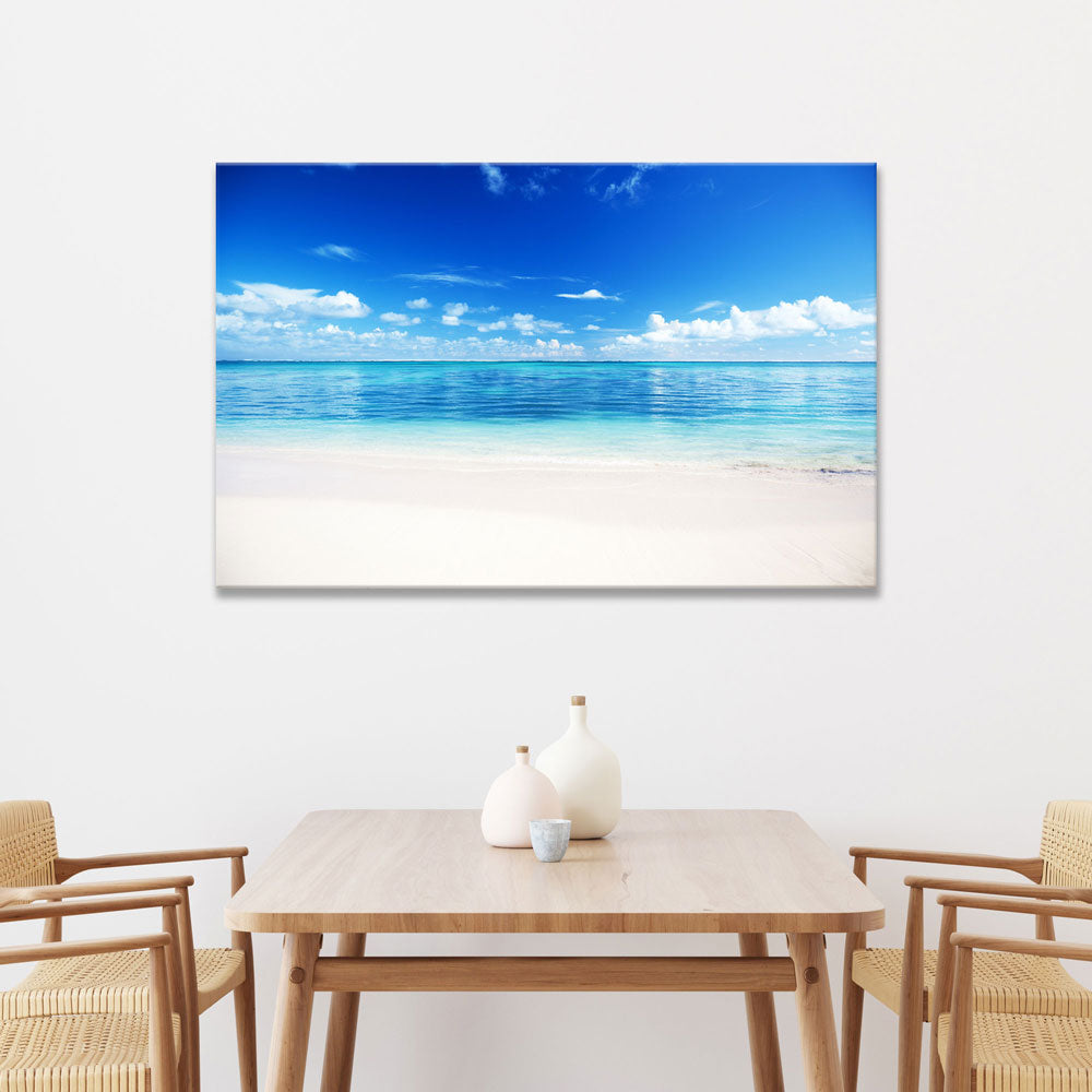 Leinwandbild "Strand und Meer" über dem Essbereich 