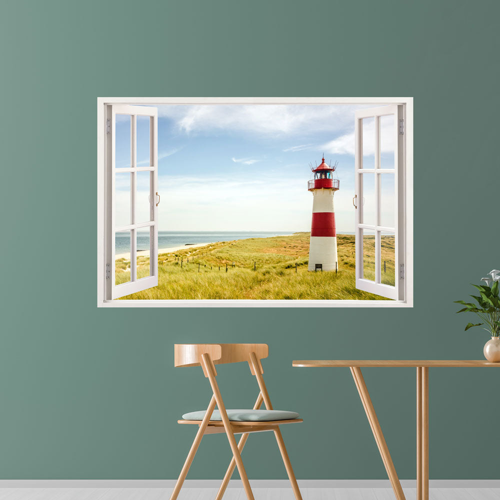 Leinwandbild für Essbereich mit geöffnetem Fenstermotiv und Blick auf idyllische Dünenlandschaft mit Leuchtturm